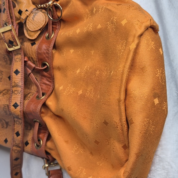 MCM Cognac Leather Drawstring Shoulder Crossbody Bucket Bag with Charm - Picture 14 of 17